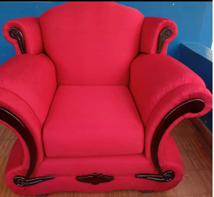 Red upholstered armchair